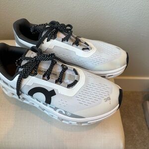 On Running Cloudmonster Black and White Sneakers